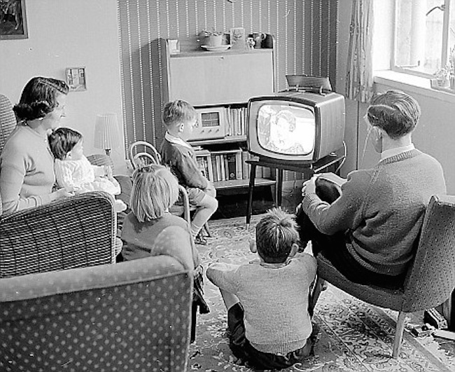 family watching television